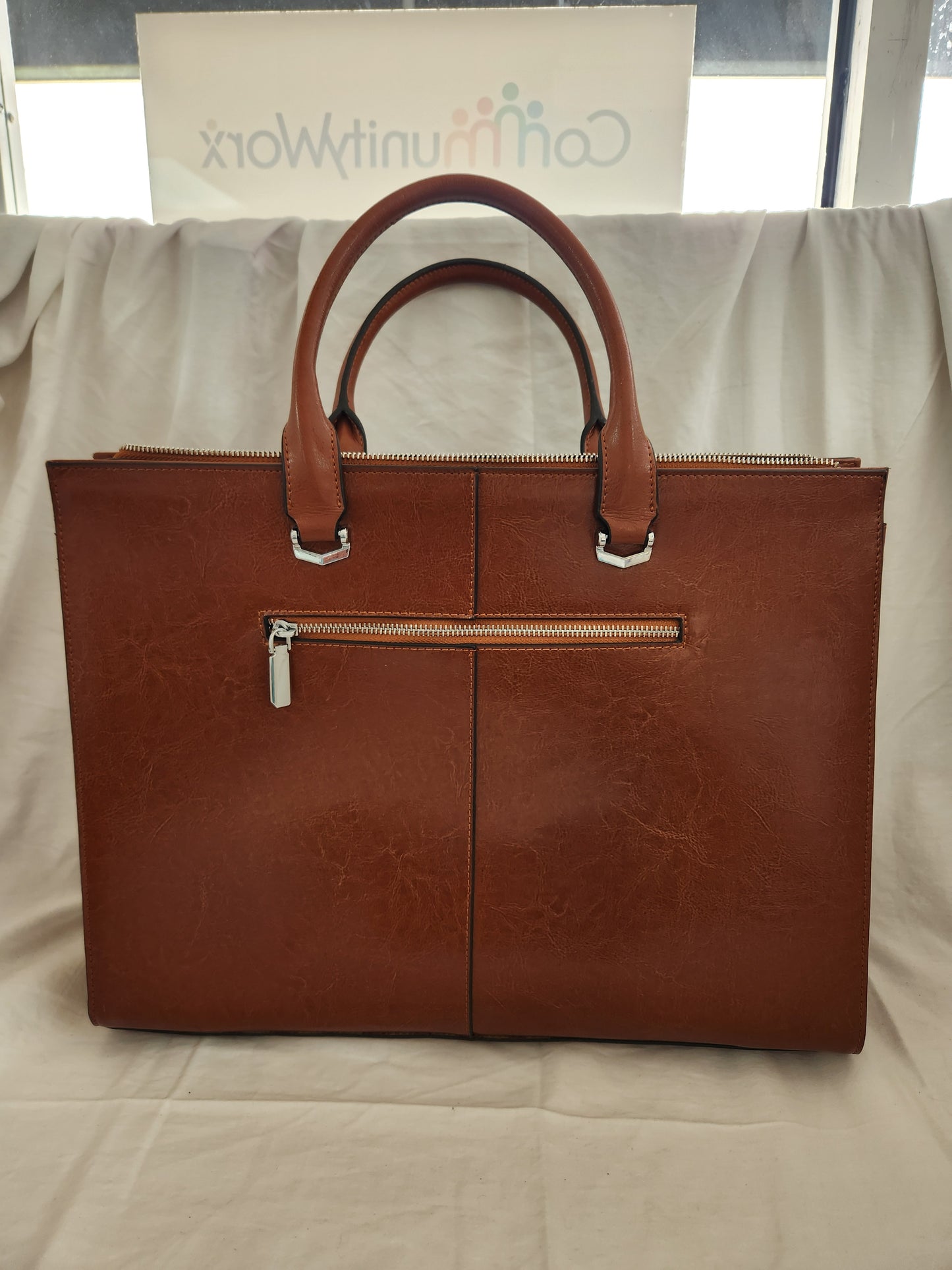 CLUCI Genuine Leather Briefcase holds a slim 15.6 Inch Laptop