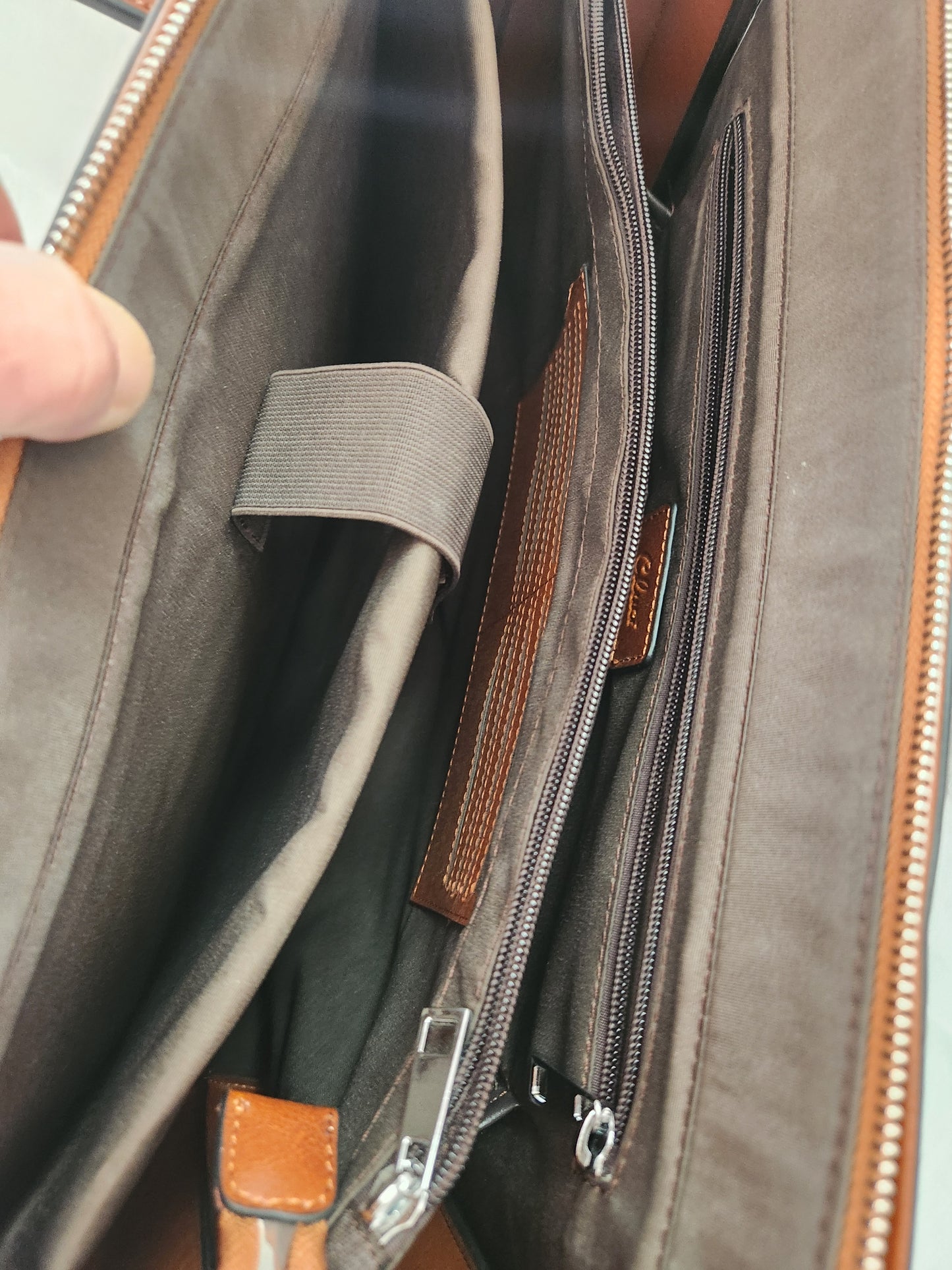 CLUCI Genuine Leather Briefcase holds a slim 15.6 Inch Laptop