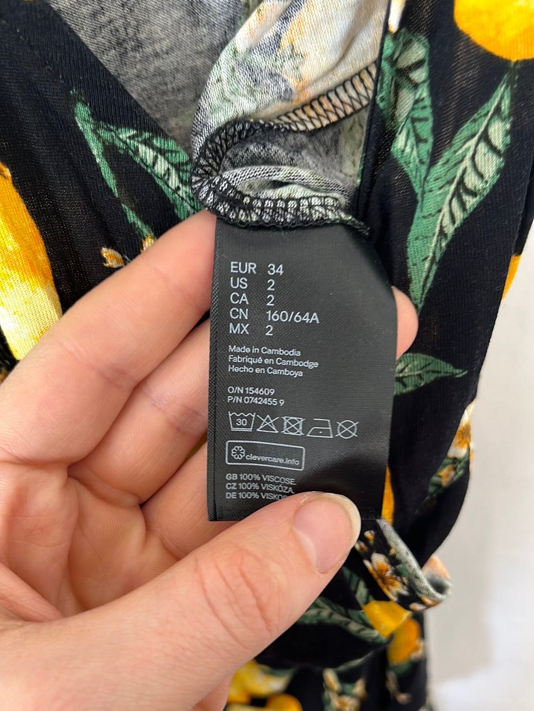 NWT -- H&M Divided Black Lemon-Print Romper -- Size 2