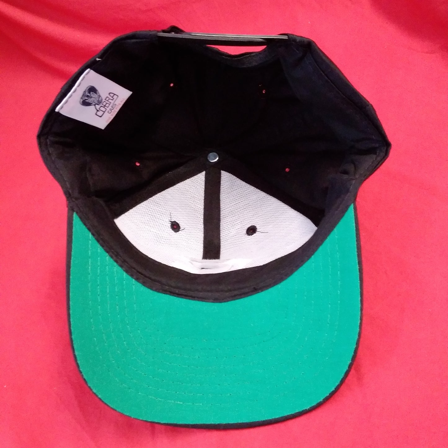 New - Black Cap with Silver "C" Logo by Cobra Caps - One Size Fits All