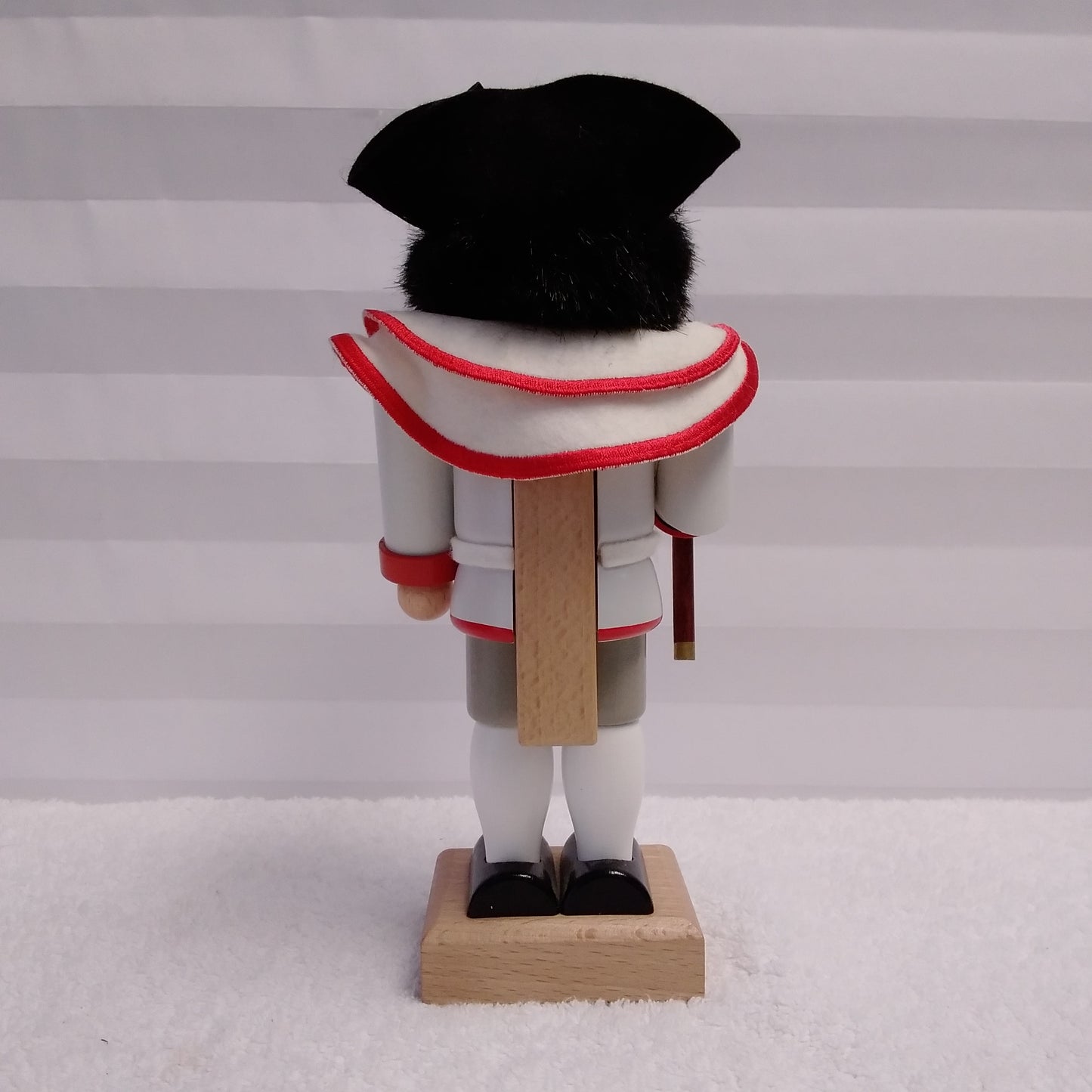 RARE - Signed Christian Ulbricht Nutcracker Wearing a White Jacket with Red Trim Holding a Flute