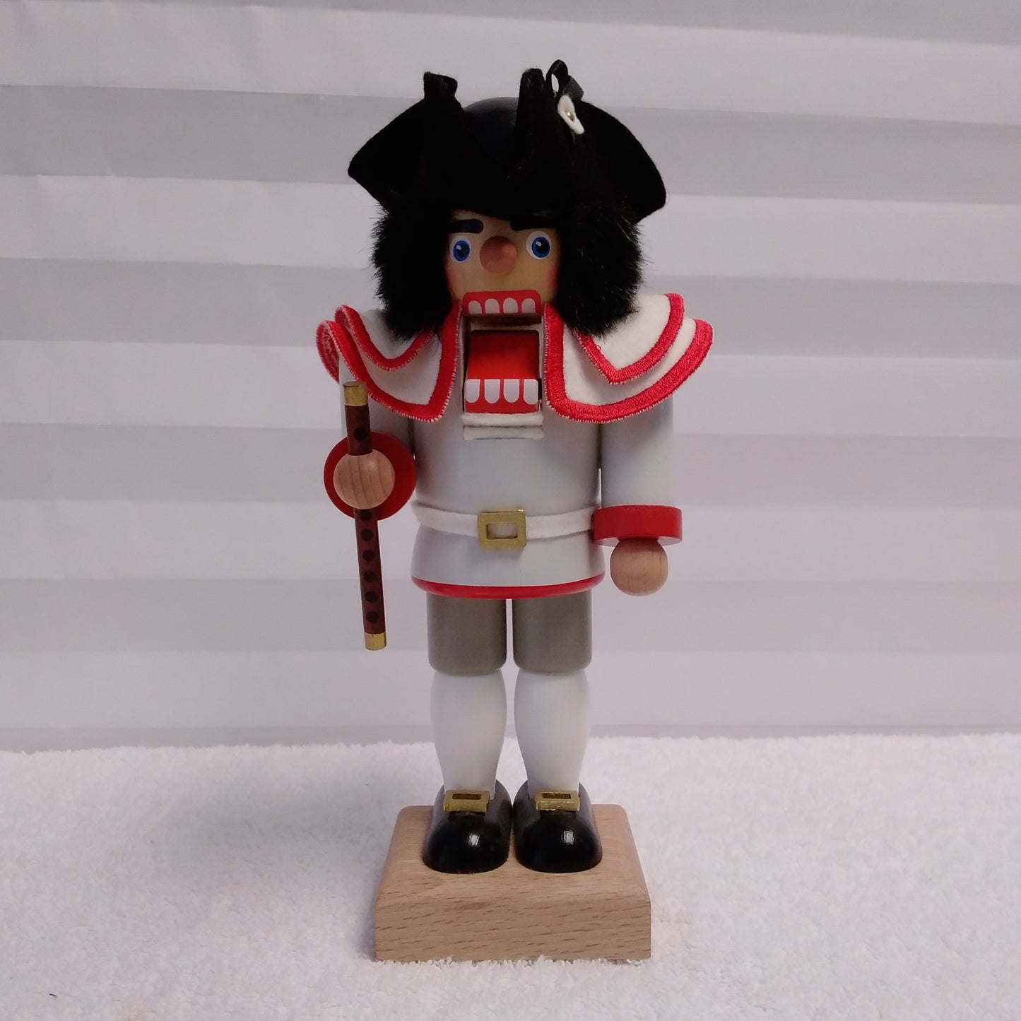 RARE - Signed Christian Ulbricht Nutcracker Wearing a White Jacket with Red Trim Holding a Flute