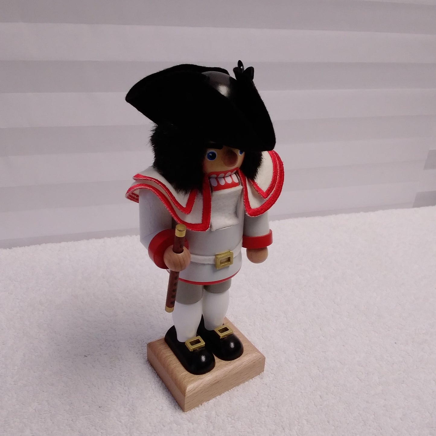 RARE - Signed Christian Ulbricht Nutcracker Wearing a White Jacket with Red Trim Holding a Flute