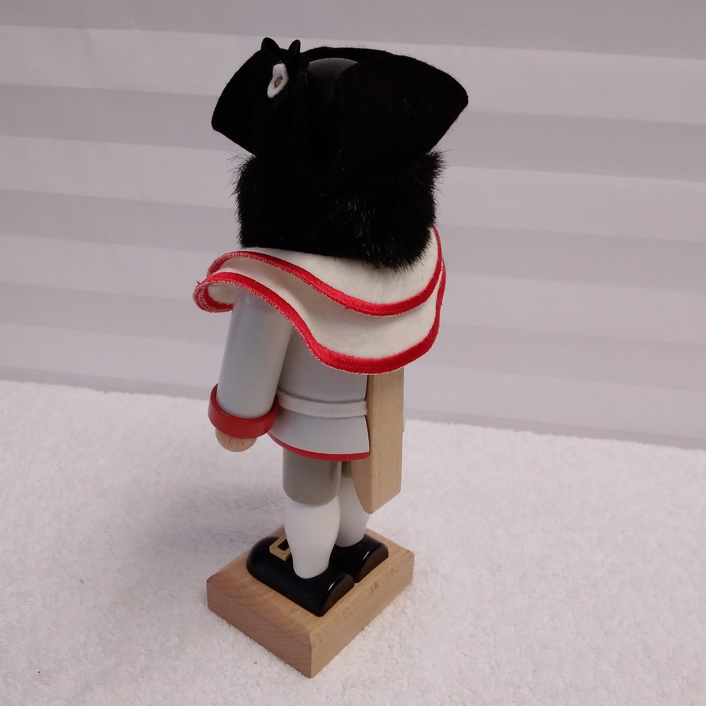 RARE - Signed Christian Ulbricht Nutcracker Wearing a White Jacket with Red Trim Holding a Flute