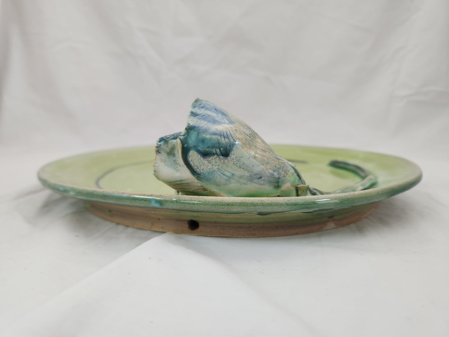 Arona ~ Wheel Thrown Pottery Green Glazed Wall Plate with Tulip Flower