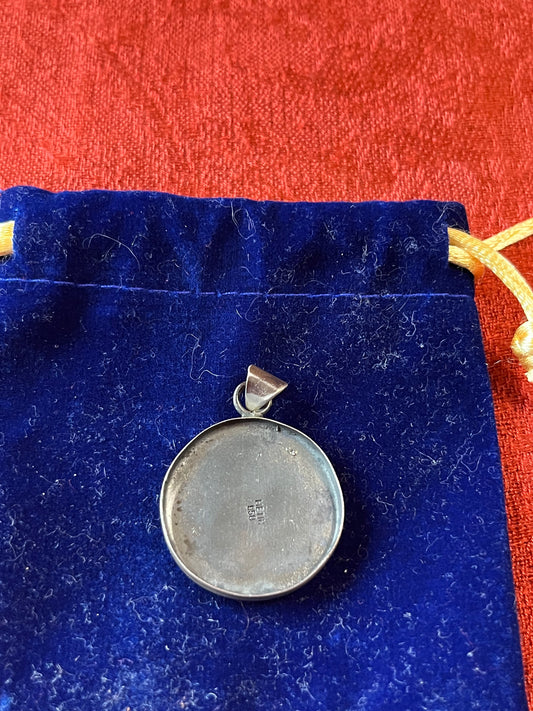 Handcrafted Sterling Silver Pendant with Character Motif