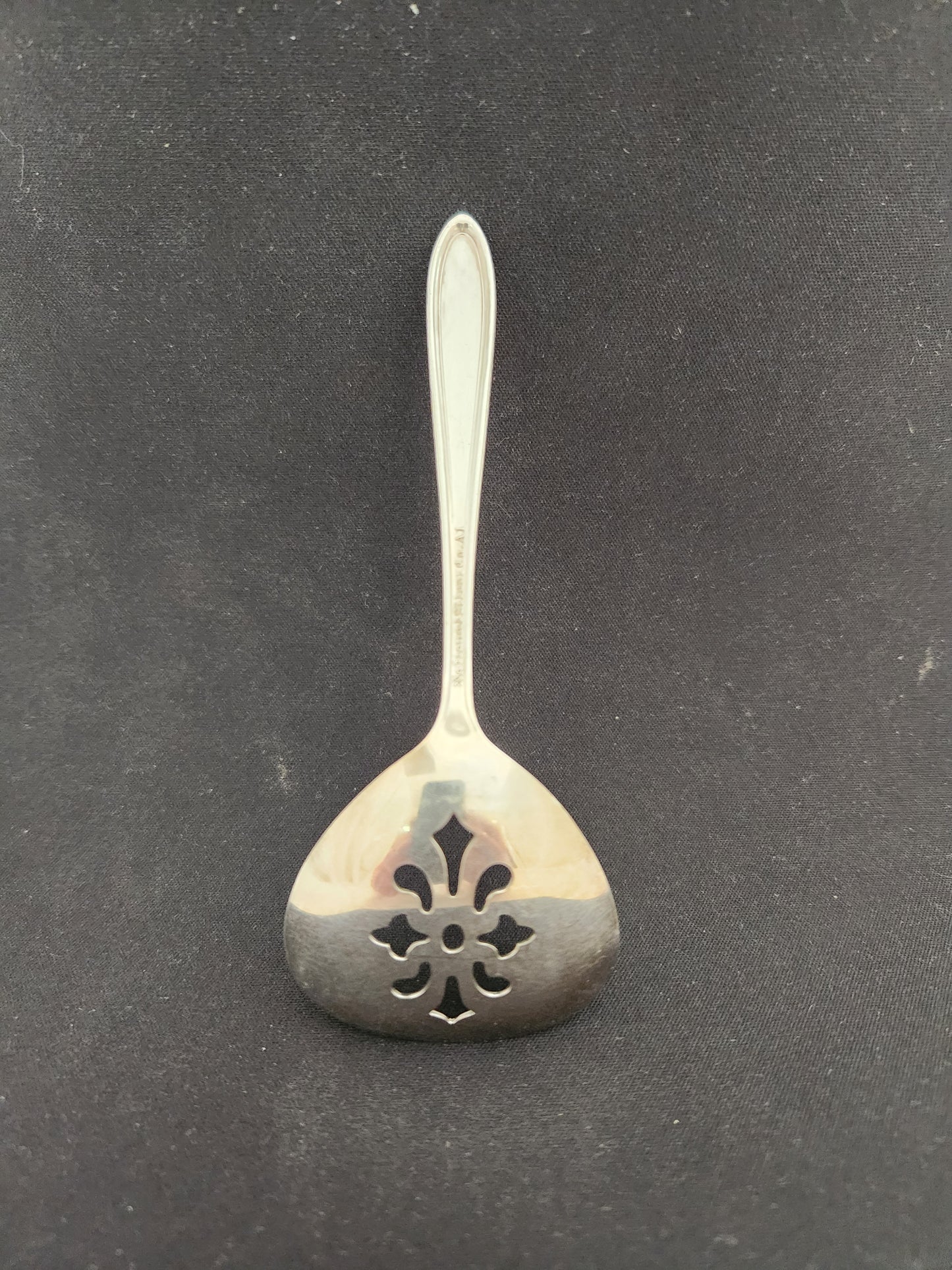 Vintage - National Silver Co. A1 4-3/4" Slotted Spoon