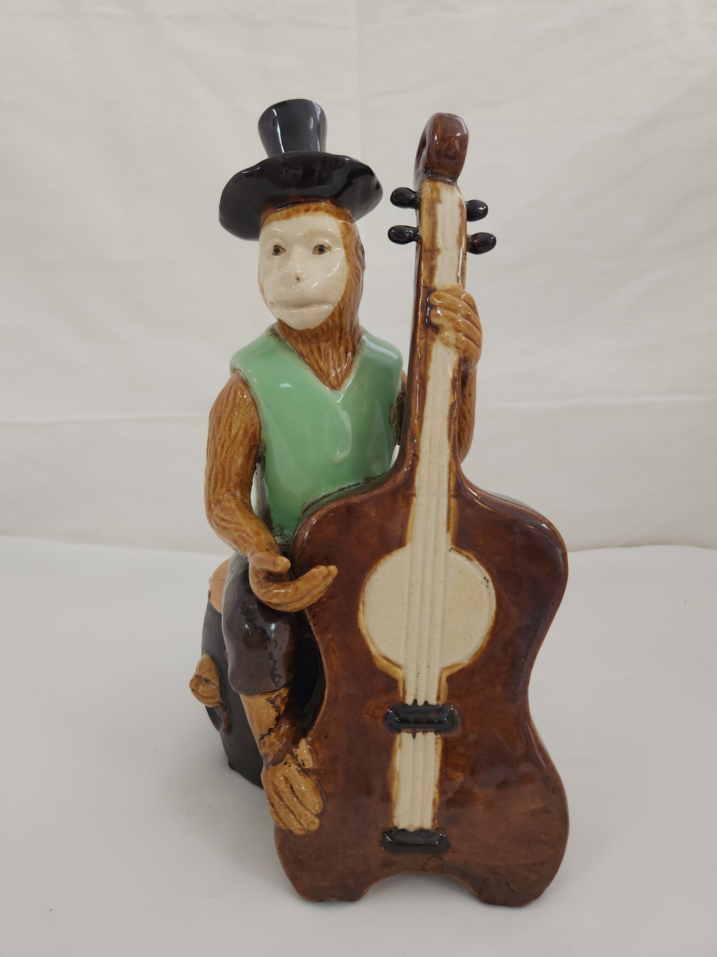 Monkey Playing a Cello Sitting On Drum Table Top Ceramic Figure