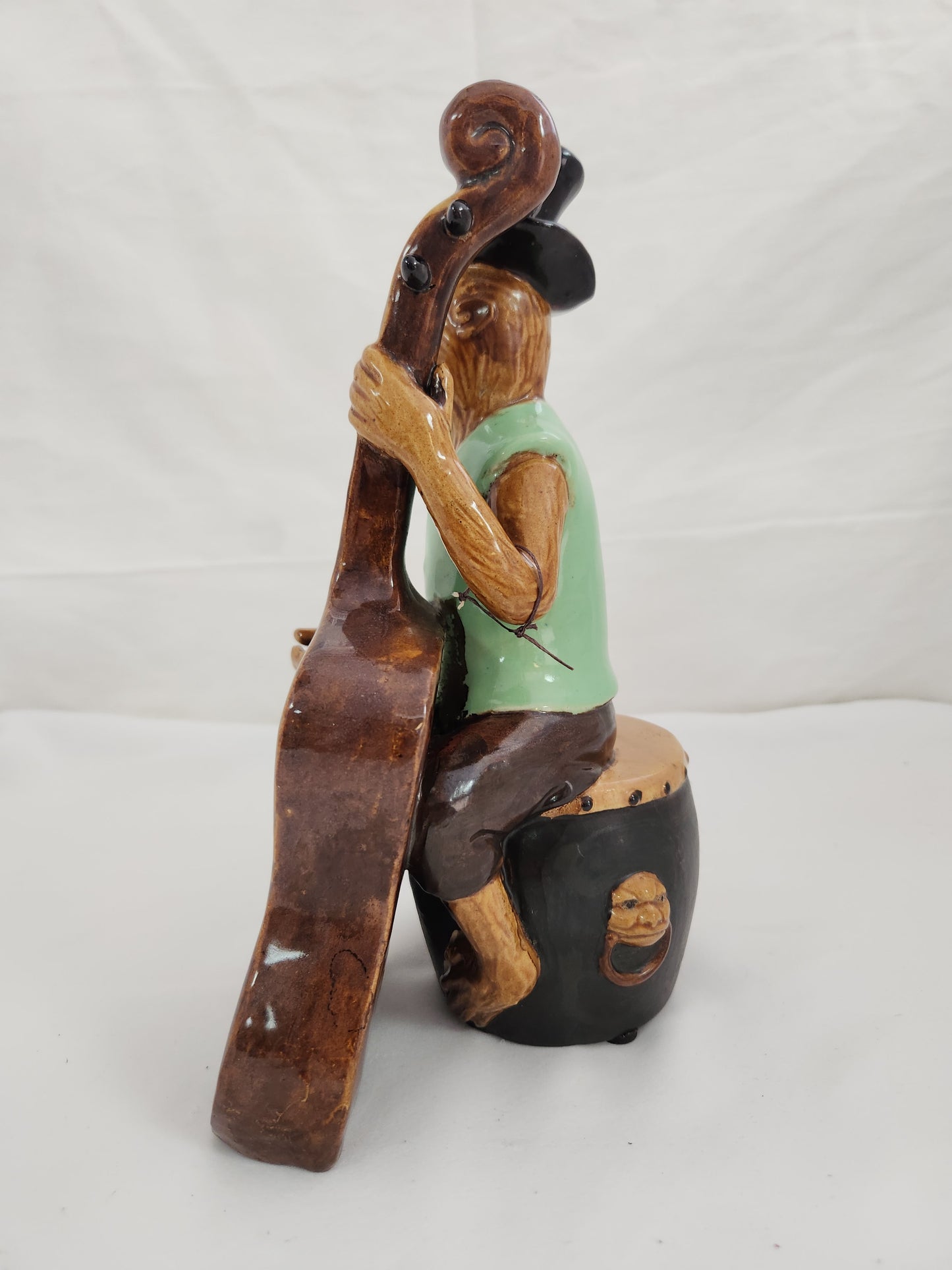 Monkey Playing a Cello Sitting On Drum Table Top Ceramic Figure