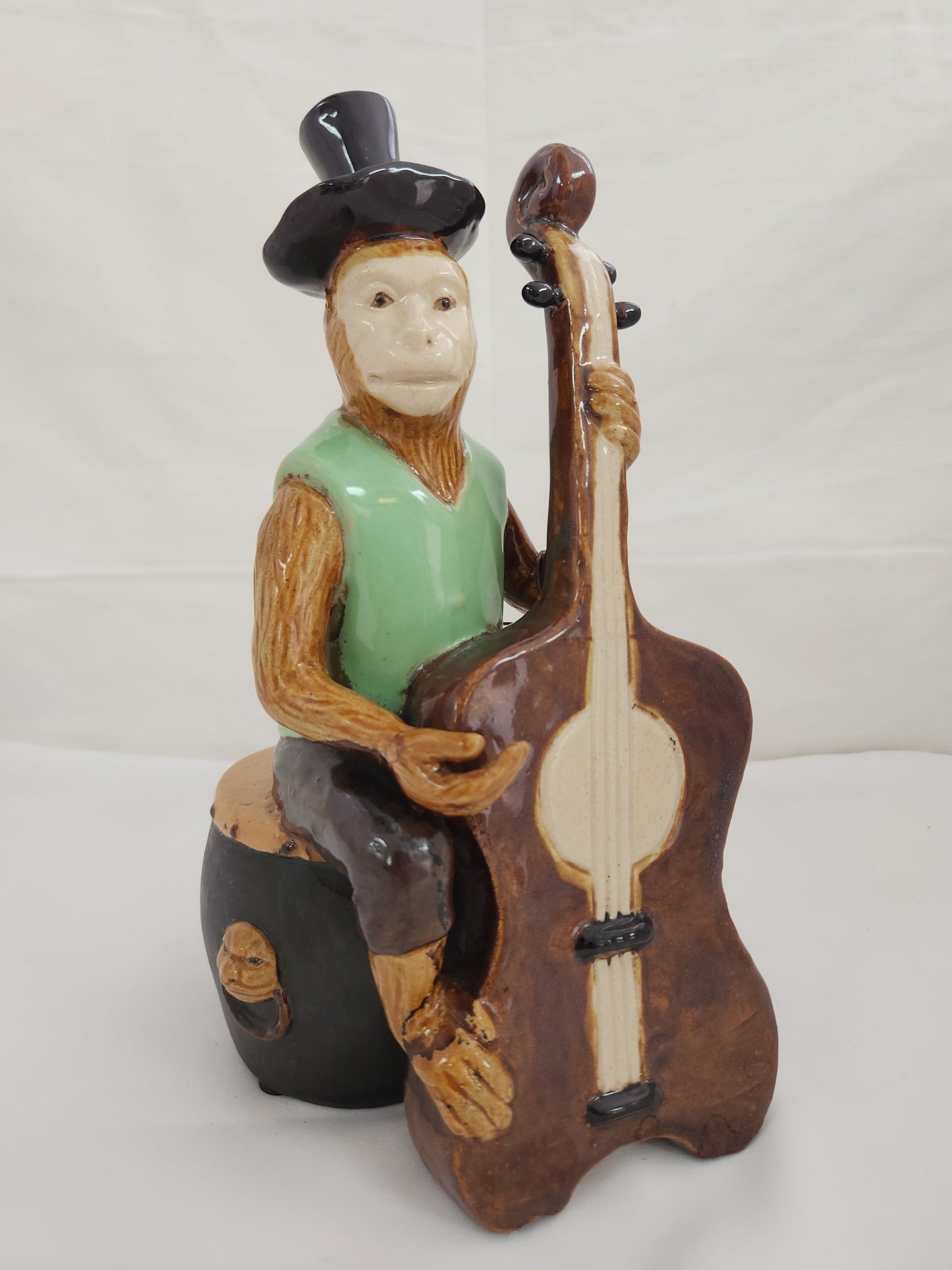 Monkey Playing a Cello Sitting On Drum Table Top Ceramic Figure