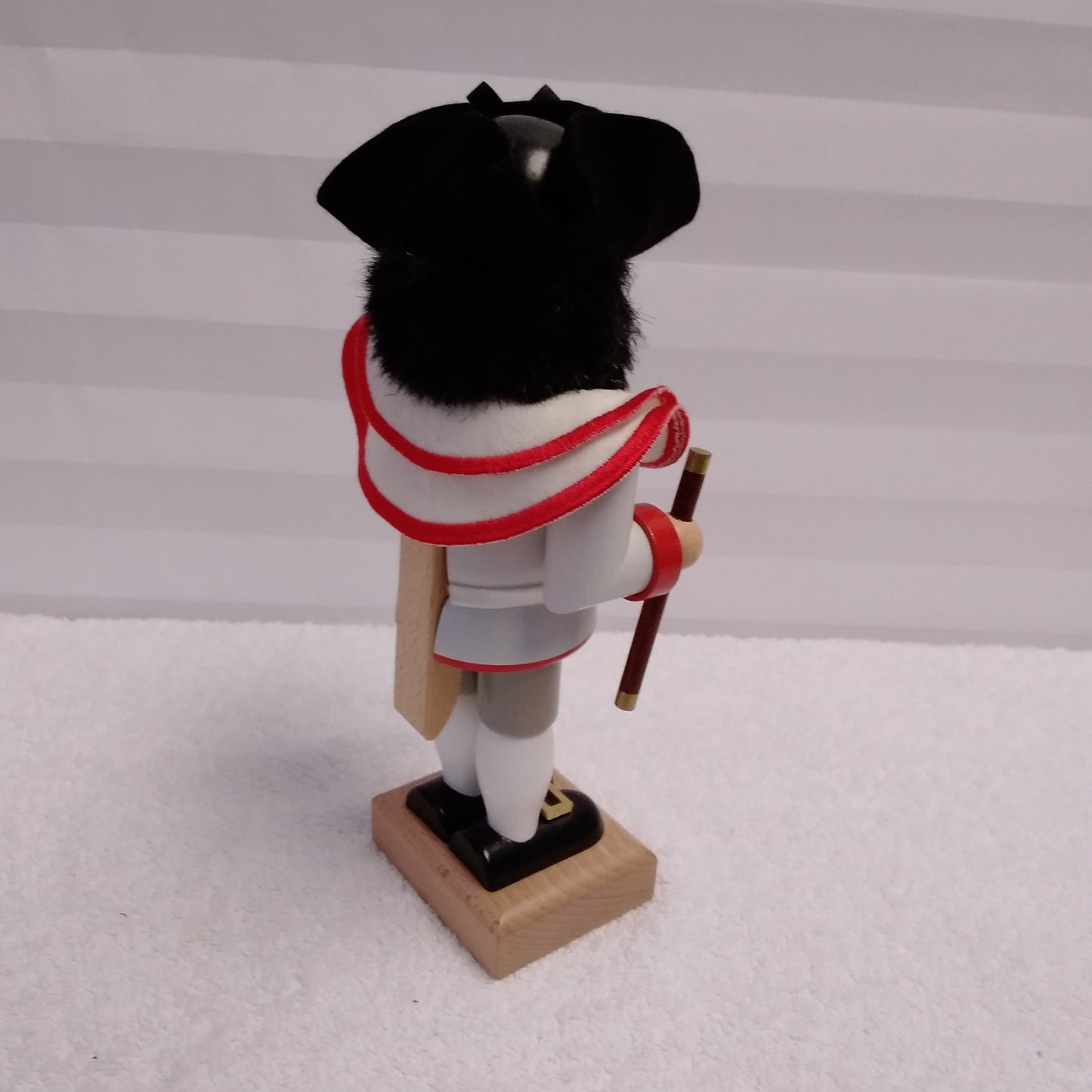 RARE - Signed Christian Ulbricht Nutcracker Wearing a White Jacket with Red Trim Holding a Flute
