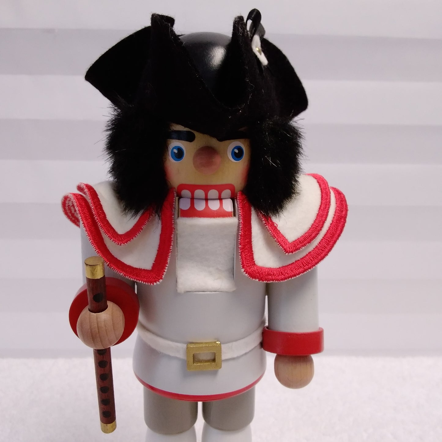 RARE - Signed Christian Ulbricht Nutcracker Wearing a White Jacket with Red Trim Holding a Flute