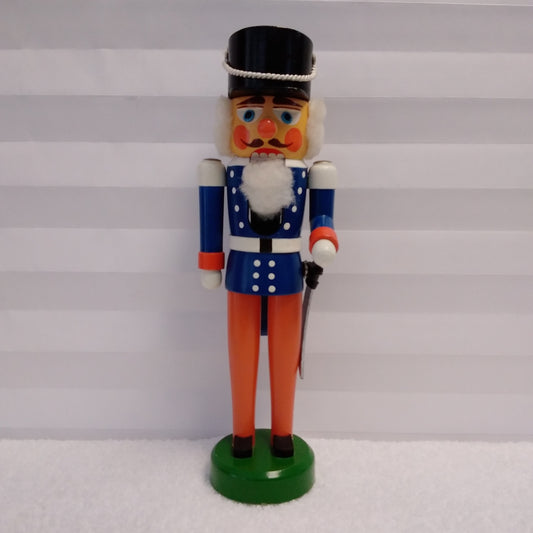 Vintage - Soldier Nutcracker Wearing a Blue Jacket and Orange Pants with Sword