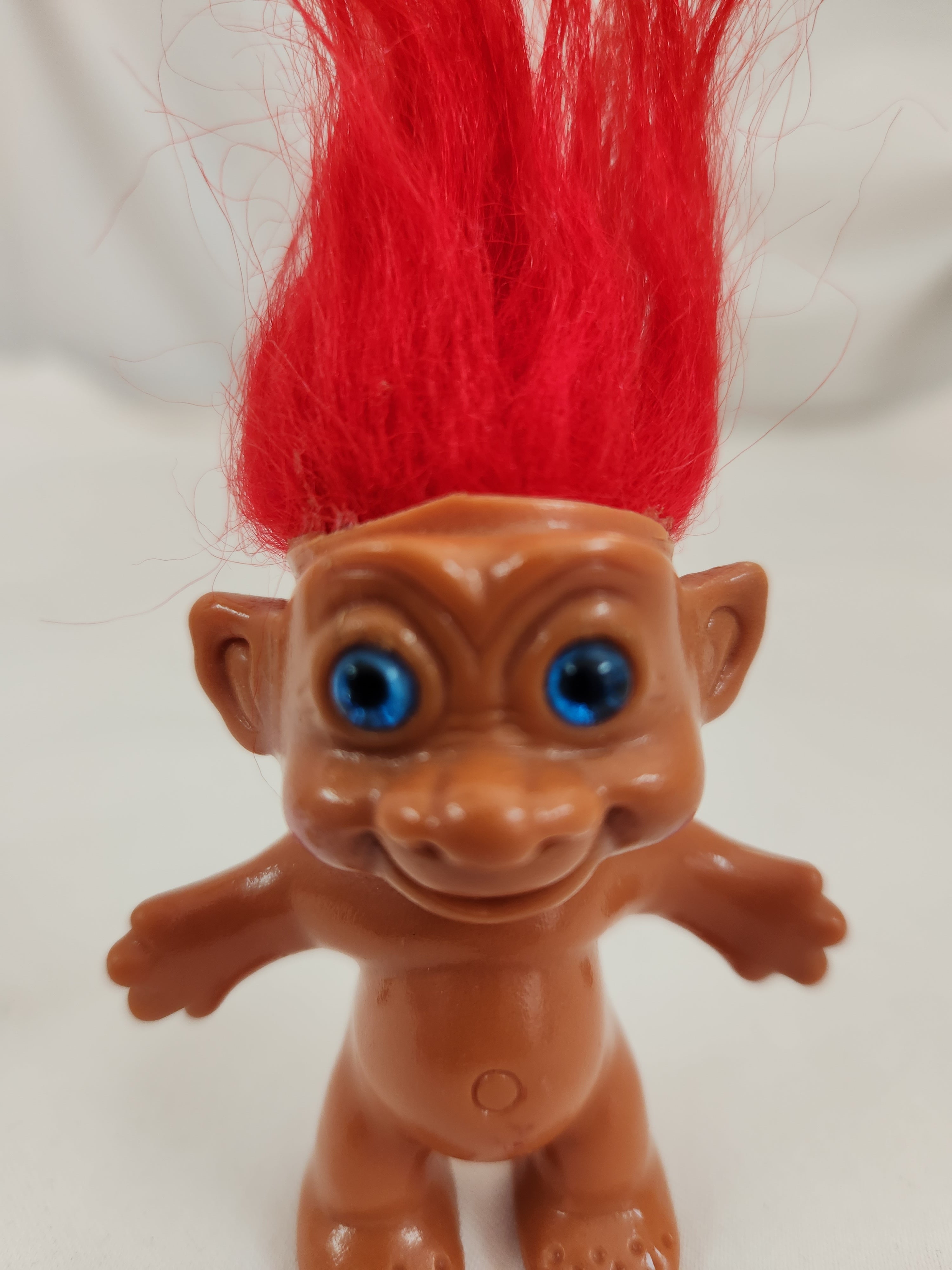 Troll with cheap red hair